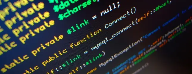 Language Fanboyism Some PHP on a screen at an angle